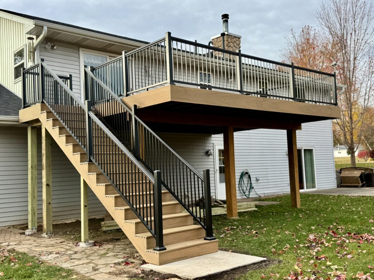 Raised deck with cable railing on a Northwoods cabin